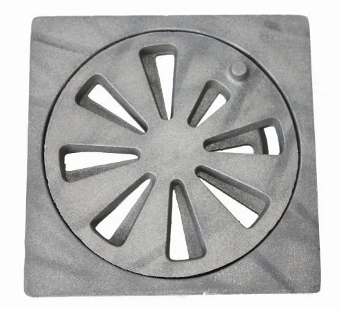 Ruszt wibracyjny z żeliwa, okrągły ø 190 mm, łącznie z prostokątną nakładką, grubość materiału 25 mm, 210 x 210 mm (szerokość x głębokość).